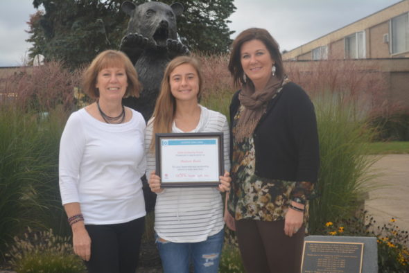 Madison Beach, center, was one of two national recipients of the Leaders Save Lives Scholarships from the American Red Cross. Also pictured are Shelley McPeek, school nurse (left), and Tricia Ford, American Red Cross representative (right).