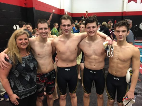 The River View swimming boys relay team got their record time. From left is Coach King, nate Cooper, Jake Mitchell, RJ Hammond, Caleb Fischer.