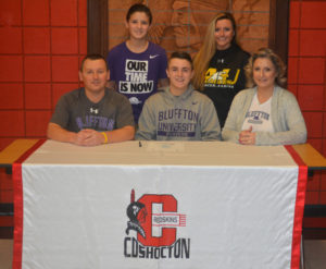 Coshocton High School senior Jacob Ramsey signed his letter of intent to play soccer at Bluffton University on Feb. 1 at CHS. Pictured in front from left are: Brent Ramsey, Jacob, Mandy Ramsey and in back are Luke Ramsey and Rachel Ramsey. Brent and Mandy are Jacob’s parents and Luke and Rachel are his siblings. Josie Sellers | Beacon