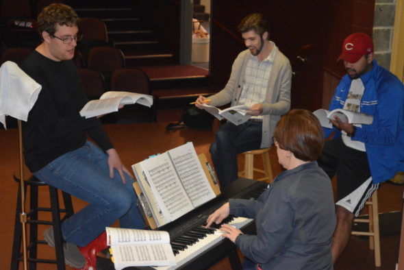 Heath Chaney, Donovan Rice and Luke Widder practice music from “Forever Plaid” with Jane Crow, who plays the piano in the production. “Forever Plaid” by Stuart Ross will be performed at 8 p.m. May 5-6, 12, 20 -21 at the Triple Locks Theater and at 2 p.m. May 14. Josie Sellers | Beacon