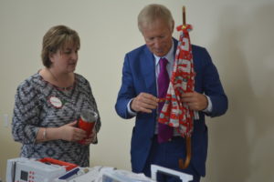 Dawn Krier from Chestnut Ridge Sewing presented Hanspeter Ueltschi, the owner of Bernina, with a special gift made by Angie Schmoldt. Ueltschi came to the store to visit with customers and celebrate its successful sales of Bernina products to customers. Josie Sellers | Beacon