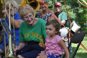 Leanne Reed, who will be 2 years old in October, joined the Walhonding Rube Band with her harmonica for a few moments next to her Grandma Janet Doughty, who has been a member of the band, along with her three daughters, Judy (Martin), Elaine (Ross) and Leanne’s mom, Ellen (Reed), for many years. The four, along with two uncles (Walter Doughty, Max Mercer) and several cousins and relatives are just one example of several families with multiple members and generations of musicians that enjoy performing with the band. Mark Fortune | Beacon