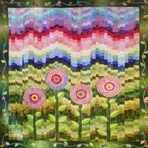 This year’s opportunity quilt was designed and quilted by Carolyn Mann, a member of the Coshocton Canal Quilters. It will be up for raffle at the Quilt Show.