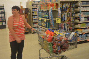 Megan Philabaum was all smiles after participating in a 90 second shopping spree at Buehler’s. Her father, Ron Egler, won a raffle for the shopping spree that was held at the senior center and asked her to make the dash through the store. Josie Sellers | Beacon