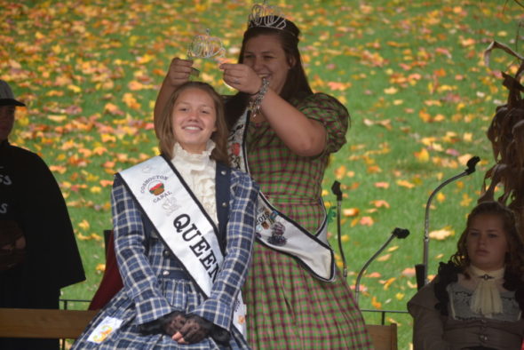  The 2015 Canal Days queen, Kristian Meek, crowns Megan Stonebraker as the final Canal Days queen during the Apple Butter Stirrin’ Festival on Saturday, Oct. 22. 
