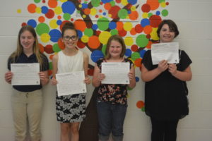 Winners of the Coshocton County Board of Developmental Disabilities essay contest are pictured from left: Kamryn Miller, fifth grade Coshocton Christian School; Vivian Heddleson, sixth grade Union Elementary; Gracie Sipe, fifth grade Union Elementary; and Rose Seioh, fifth grade Ridgewood Middle School. Winners not pictured are: Jaylynn Hewitt, fifth grade Conesville Elementary; Bridgette Bible, fifth grade Keene Elementary; and Kya Masloski, fifth grade Ridgewood Middle School. Josie Sellers | Beacon
