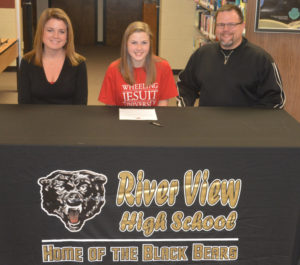 River View High School’s Zoe Smalley, center, signed to play soccer at Wheeling Jesuit University. She is pictured with her mother Lynnette Dobson and father Chris Smalley.  Josie Sellers | Beacon